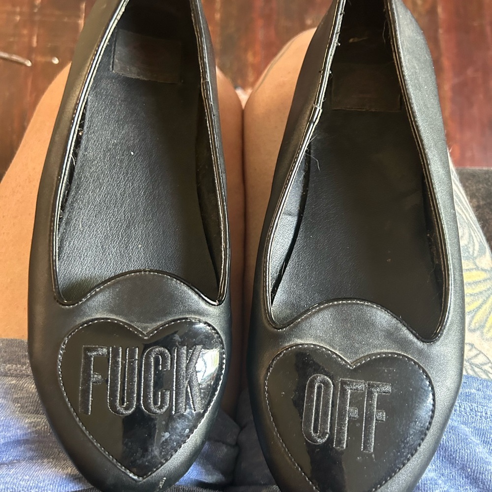 Black Leather Flats with Classic Design